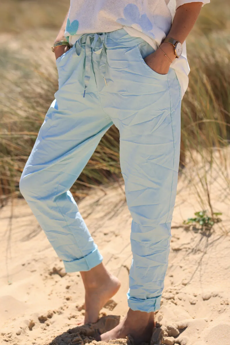 Pantalon confort vert d'eau en toile stretch étoile brillante paillettes